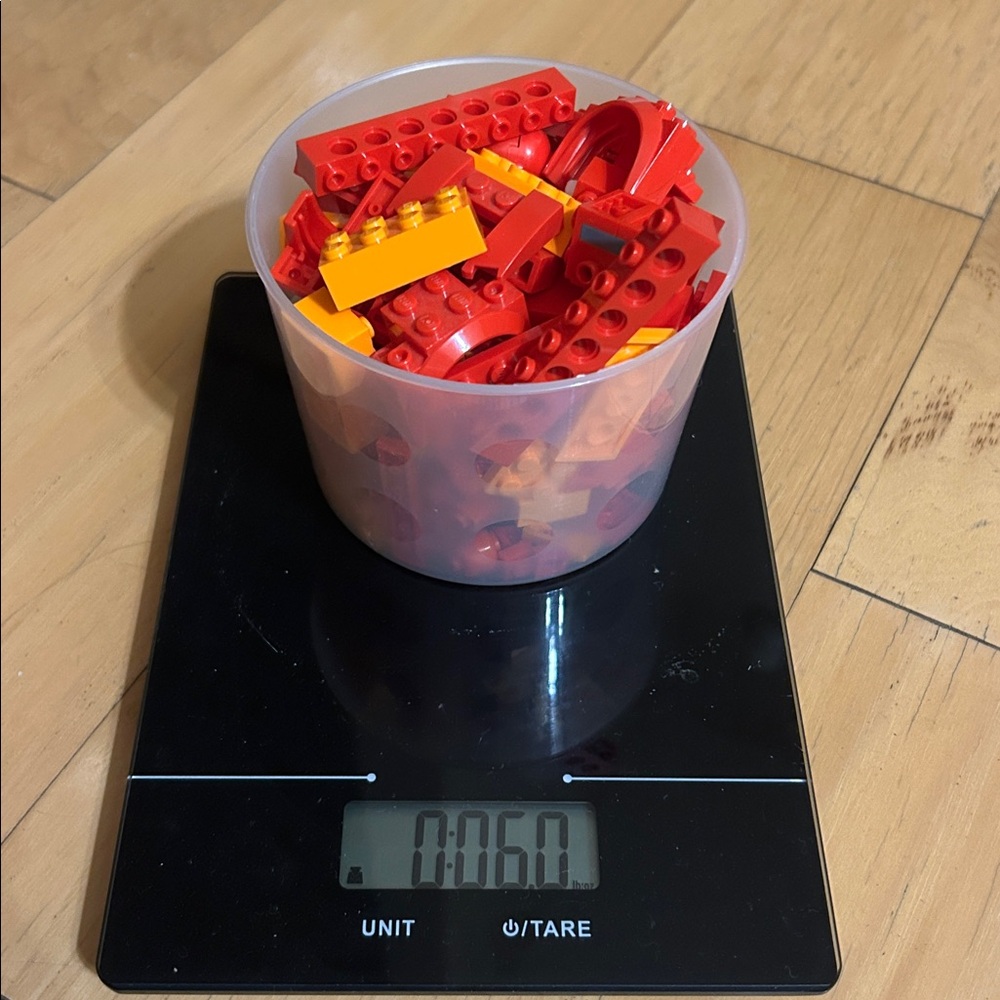 LEGO Red and Orange Blocks in Clear Container